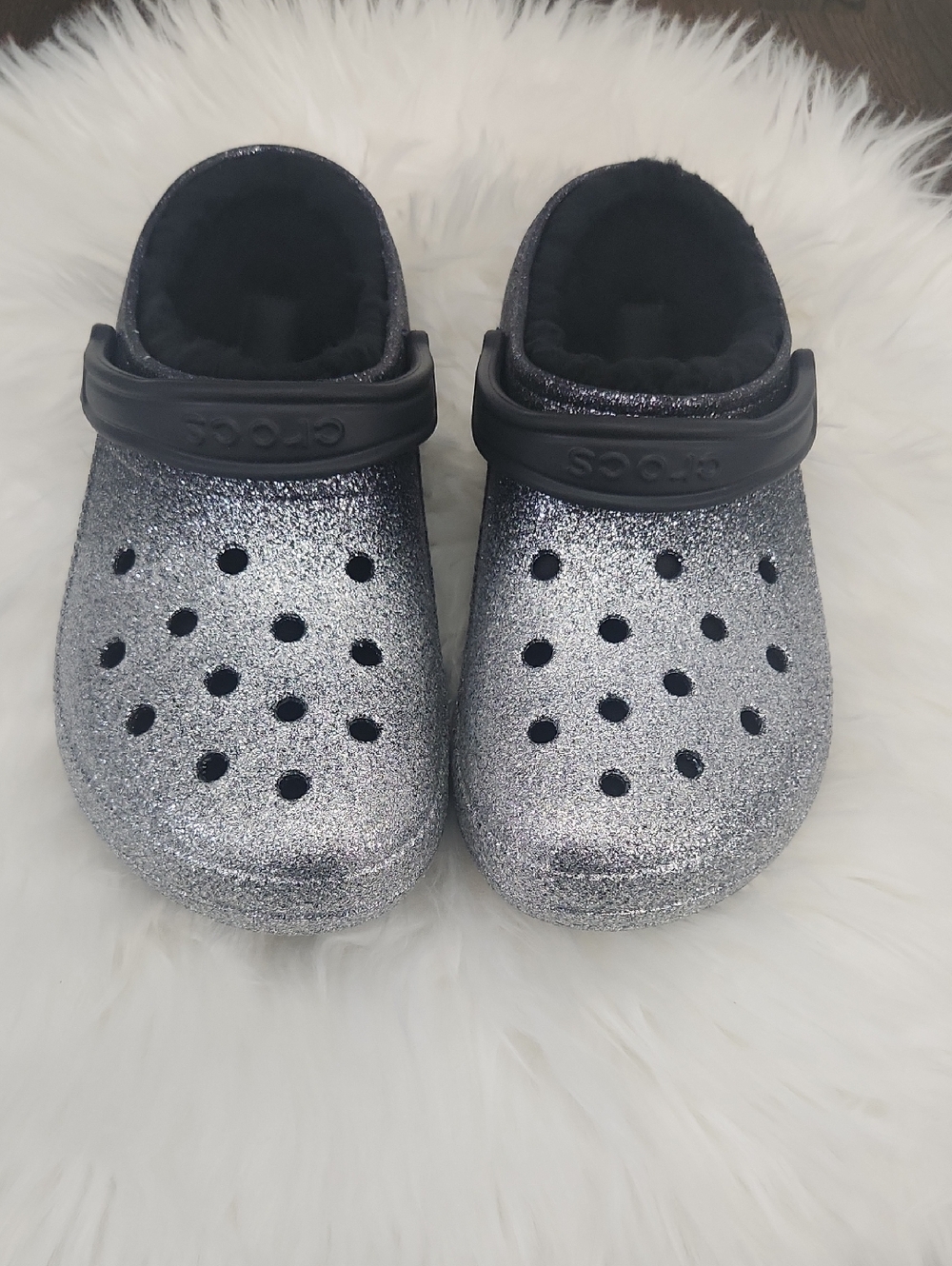 NWOT. Crocs  Unisex Classic Lined Glitter Ombre Clog Black/silver W9 M7